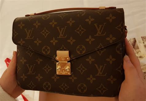 como saber que es original una bolsa louis vuitton|bolsa de marca Louis Vuitton.